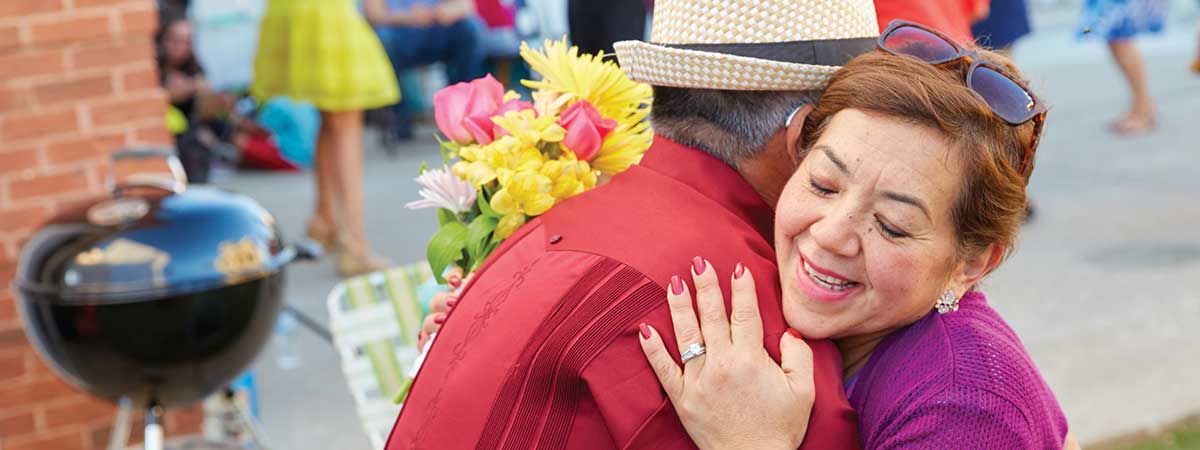 a man and a woman hugging